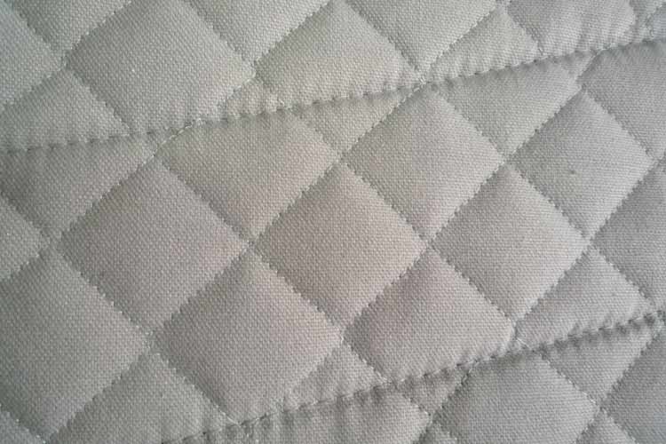 EquineLux PRESSURE-RELIEVING™ saddle pad with sheepskin lining and rolls (no pockets)