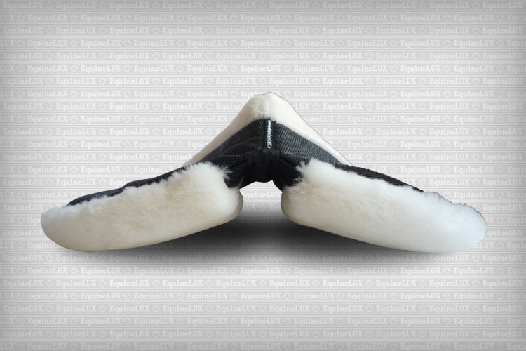 EquineLux ComfortLUX™ dressage half pad with sheepskin lining, pommel roll, and pockets for shims