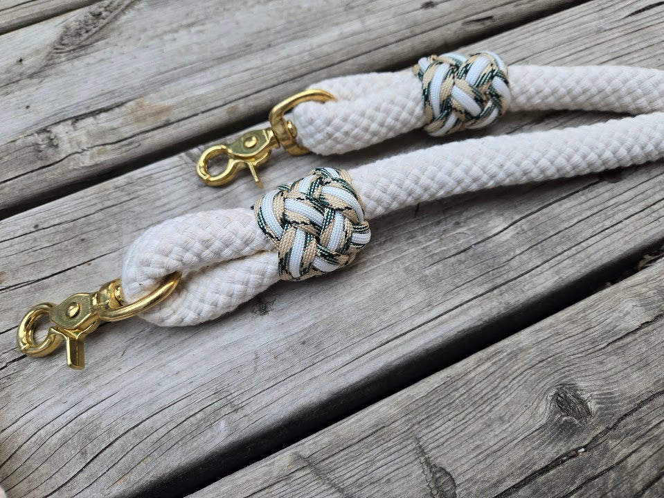 5/8" 7.5ft cream cotton reins with gold snaps and desert sand/ cream paracord turkshead knot