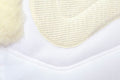 saddle pad with sheepskin lining and rolls (no pockets)