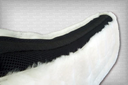 EquineLux ComfortLUX™ jumper half pad with sheepskin lining, sheepskin pommel / cantle rolls, and pockets