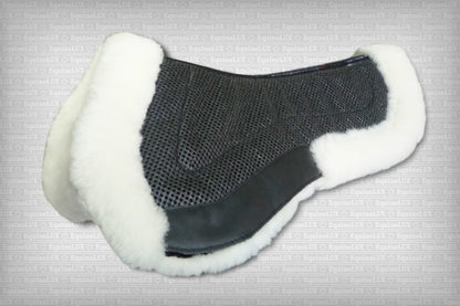 EquineLux ComfortLUX™ jumper half pad with sheepskin lining, sheepskin pommel / cantle rolls, and pockets