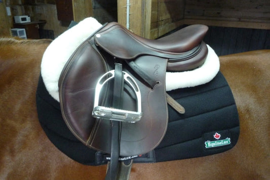 EquineLux ComfortLUX™ jumper half pad with sheepskin lining, sheepskin pommel / cantle rolls, and pockets